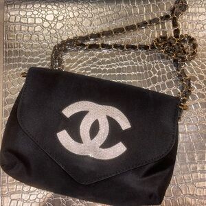 Chanel Black  Crossbody Bag with Gold Chain
From the MAKEUP line
